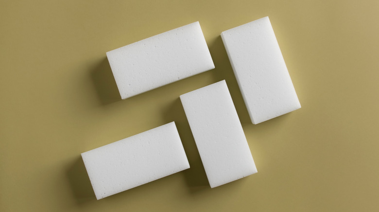 magic erasers on a green surface