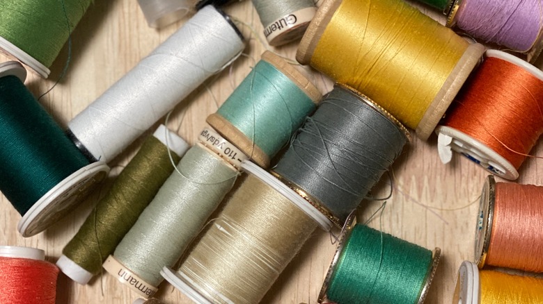 Thread in a messy craft drawer