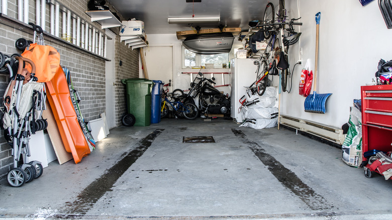 Garage floor with tires marks.