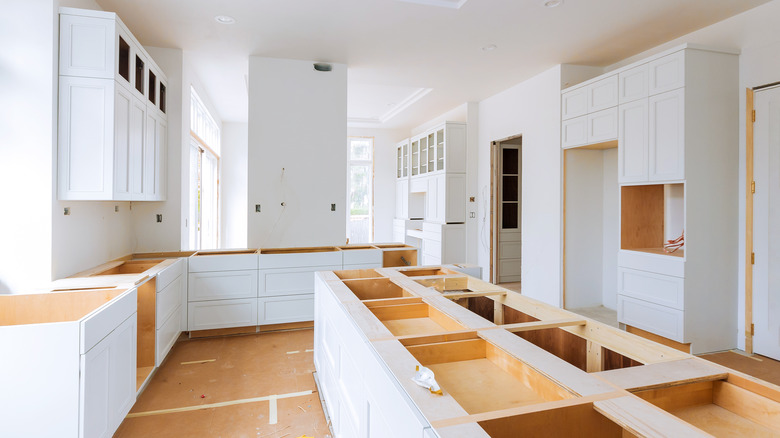 new white kitchen cabinets installed