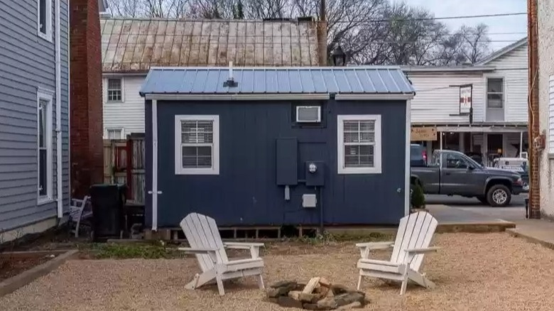 tiny blue home with chairs