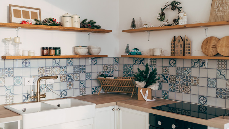 kitchen corner with no upper cabinets and small open shelves