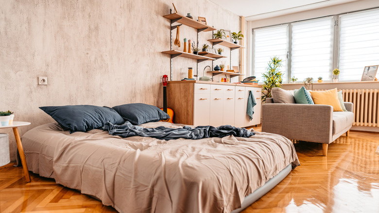 Bed and couch in studio