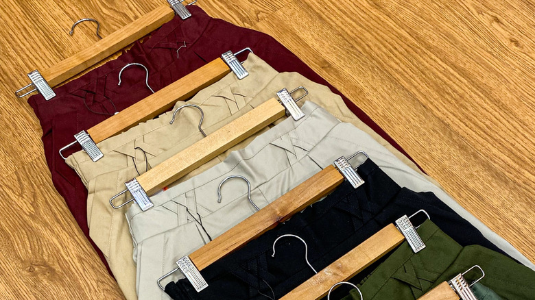 Pairs of pants on clip hangers