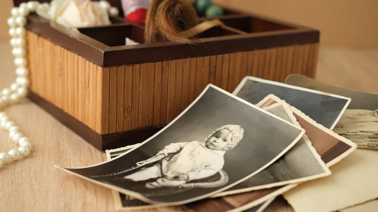 old photos next to shadowbox
