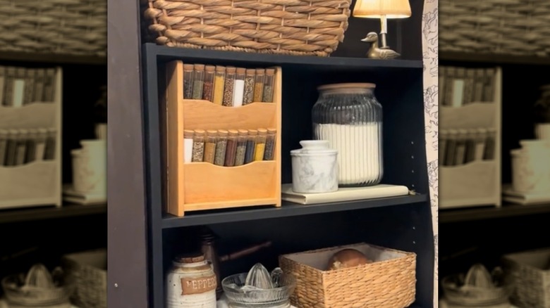 A letter-organizer-turned-spice rack on a shelf