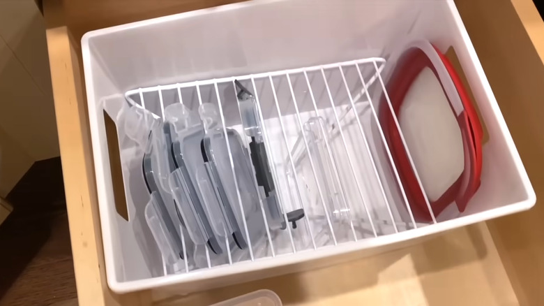 A lid organizer inside a basket