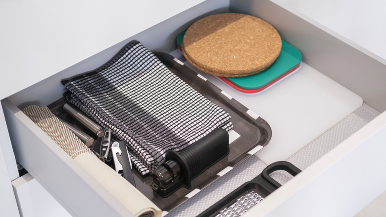 Kitchen drawer lined with rubber mat