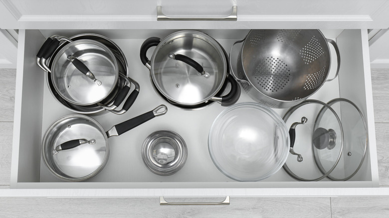 Drawer of pots and pans in a kitchen