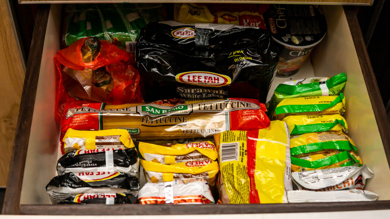 Colorful packages of snacks stored in a drawer