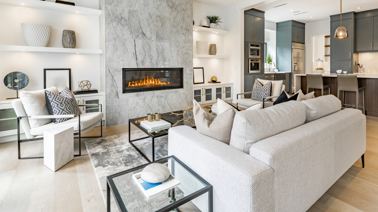 floating furniture setup with a fireplace