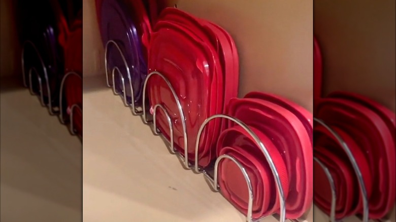 Container lids organized inside napkin holders