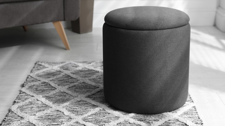 Ottoman close-up on gray rug