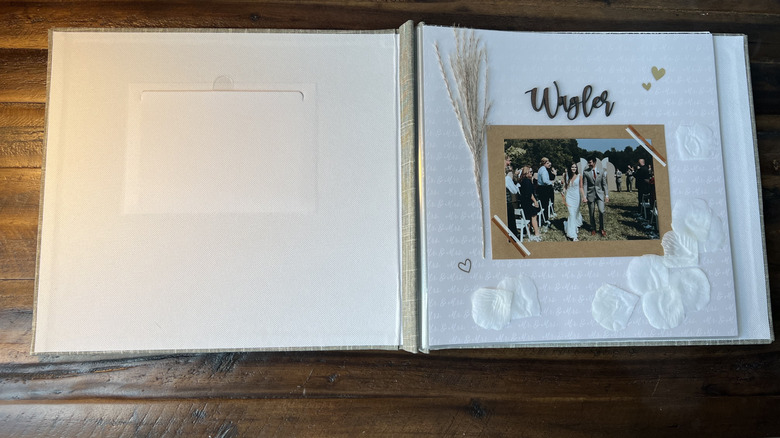 open scrapbook with designed page
