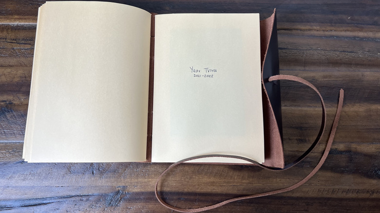 open leather photo album