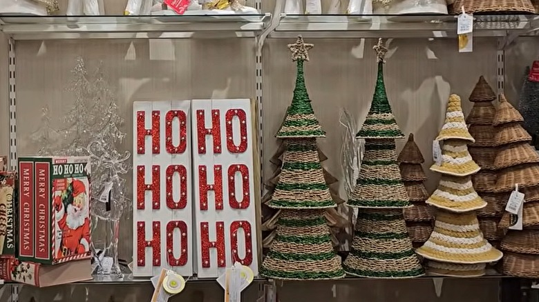 Christmas decor sits on shelves at a Home Goods store.