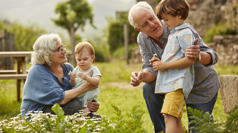 grandparents and children in garden