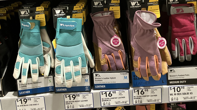 Assorted garden gloves on display at Lowe's.