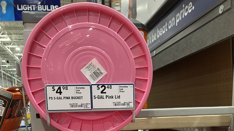Pink paint bucket and lid for sale at Lowe's.