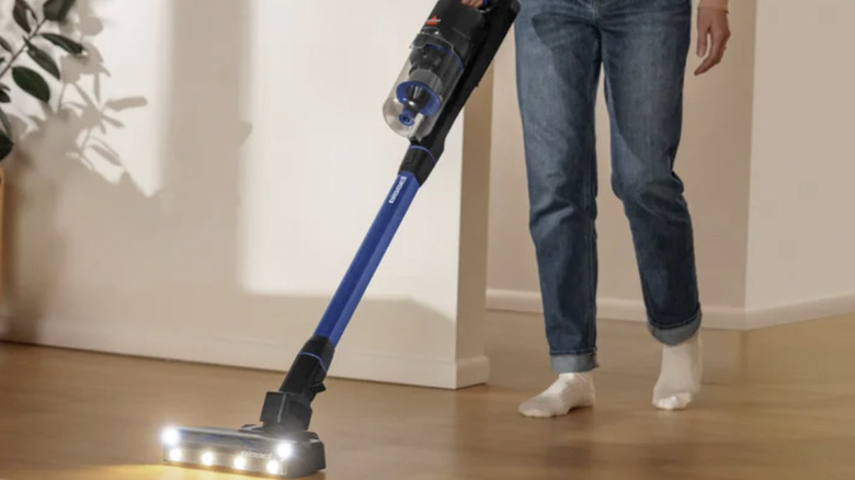 BISSELL PowerClean FurGuard Deluxe 280W Cordless Vacuum vacuuming floor in a home