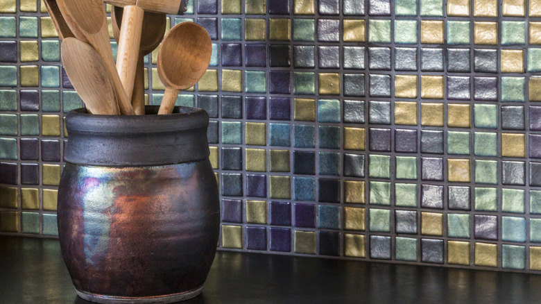 A colorful glass tile backsplash in a kitchen