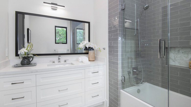 Gray and white bathroom in new build home