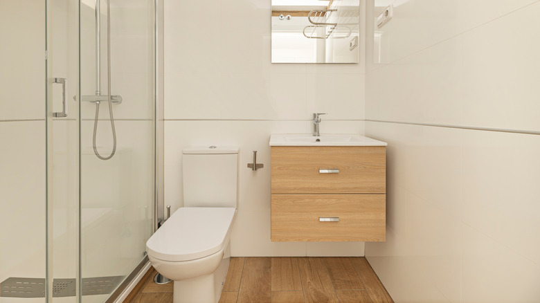 Small, builder grade bathroom vanity