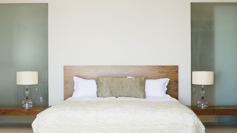 Simple bedroom with blank painted walls