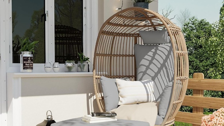 An egg chair on a patio