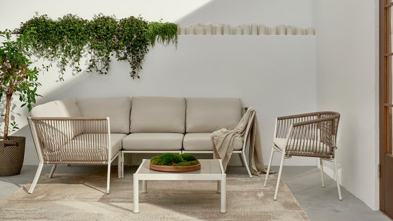 A beige sectional seater under the sun