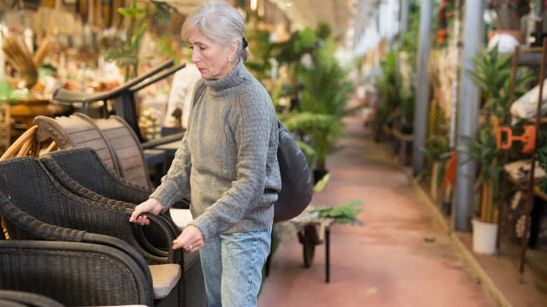 Woman shopping for an outdoor patio set