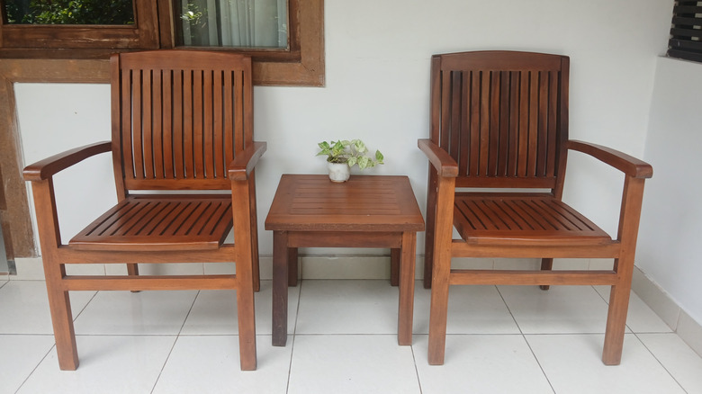 Teak chairs on a patio