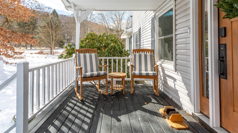 A classic front porch setup with rocking chairs