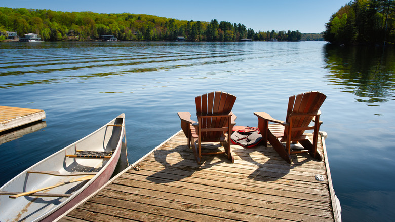 Lakeside deck with wood chairs