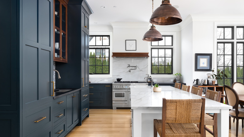 dark blue and quartz kitchen