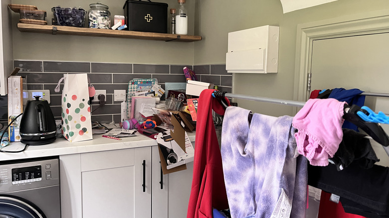 Cluttered laundry room