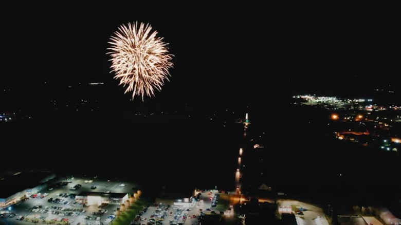 An aerial view of Hermitage, PA shows a nighttime fireworks display.