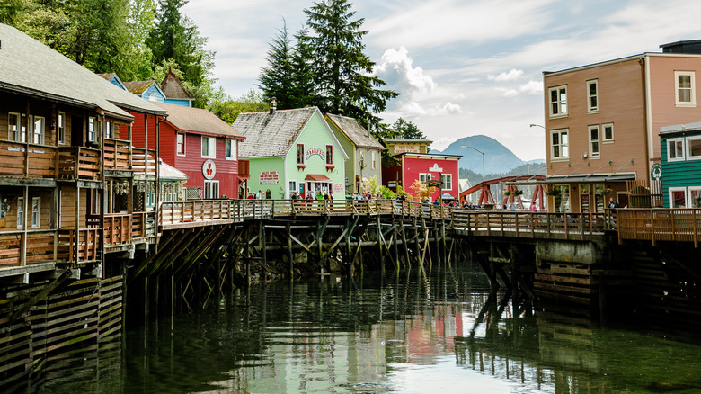 The colorful buildings of Ketchikan are perched above the water.