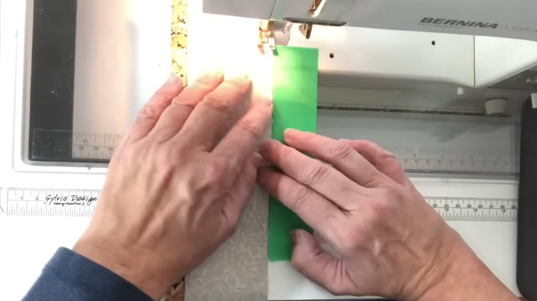 A sewing ledge made with multiple strips of painter's tape
