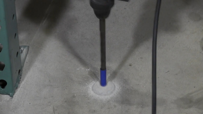 Drilling in concrete to the depth set with painter's tape