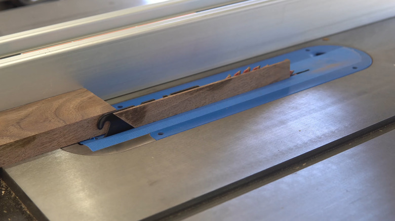 Painter's tape used as a table saw zero-clearance insert