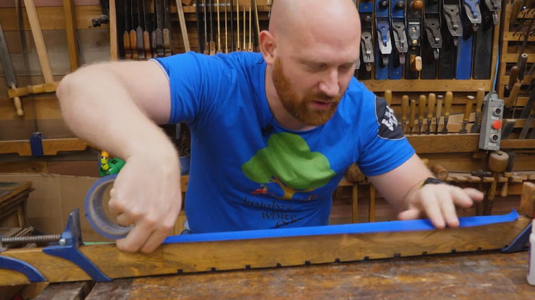 Protecting a wooden bar clamp from glue with painter's tape