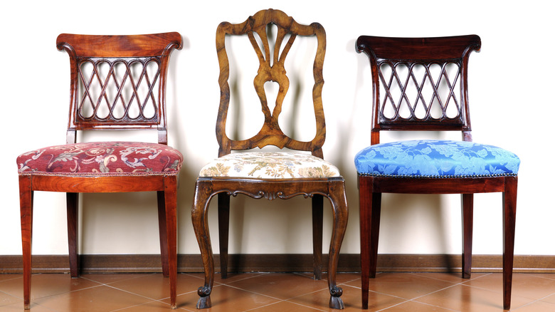 antique chairs with fabric cushions