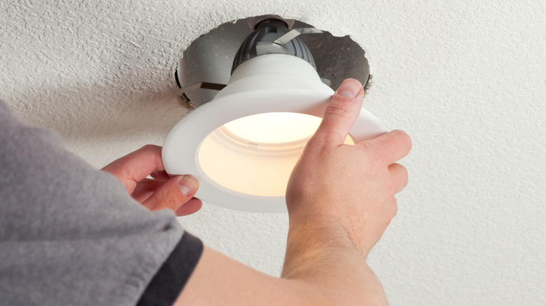 Person installing light