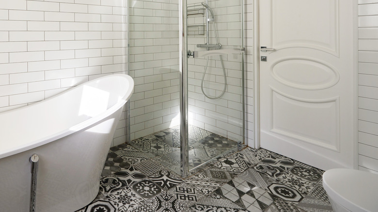 modern gray and white bathroom with patterned tile floor