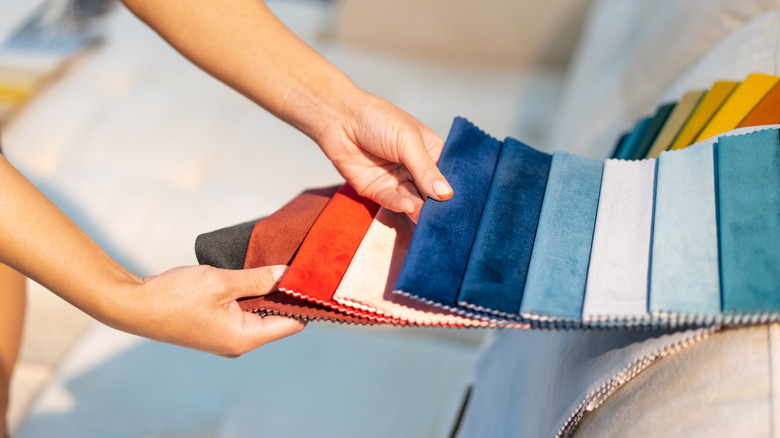 A vibrant living room with velvet and printed details