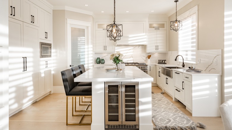 Completely white kitchen and island