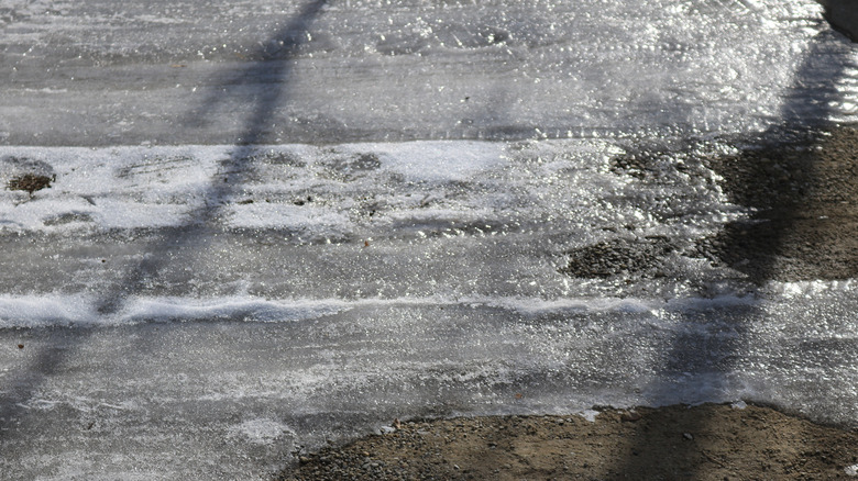 Icy driveway in various stages of melting
