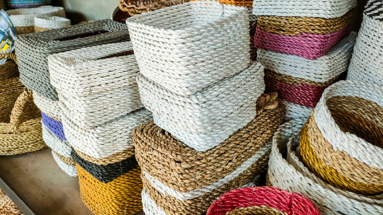 Stacks of colorful hyacinth baskets.