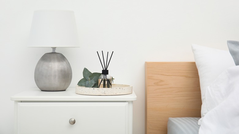 lamp and tray on nightstand